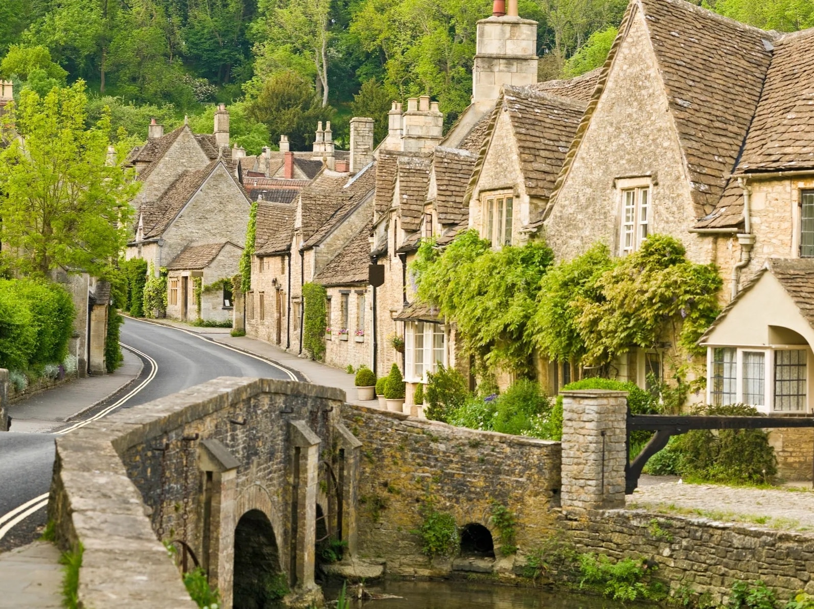 Cotswolds England honey stone village rolling hills