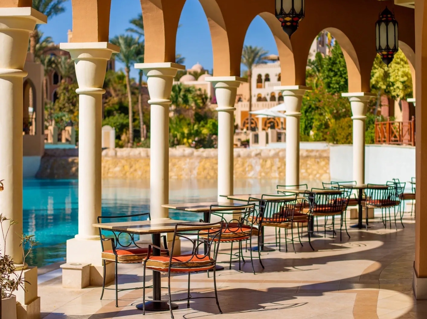 Luxury resort hotel infinity pool overlooking Mediterranean coast