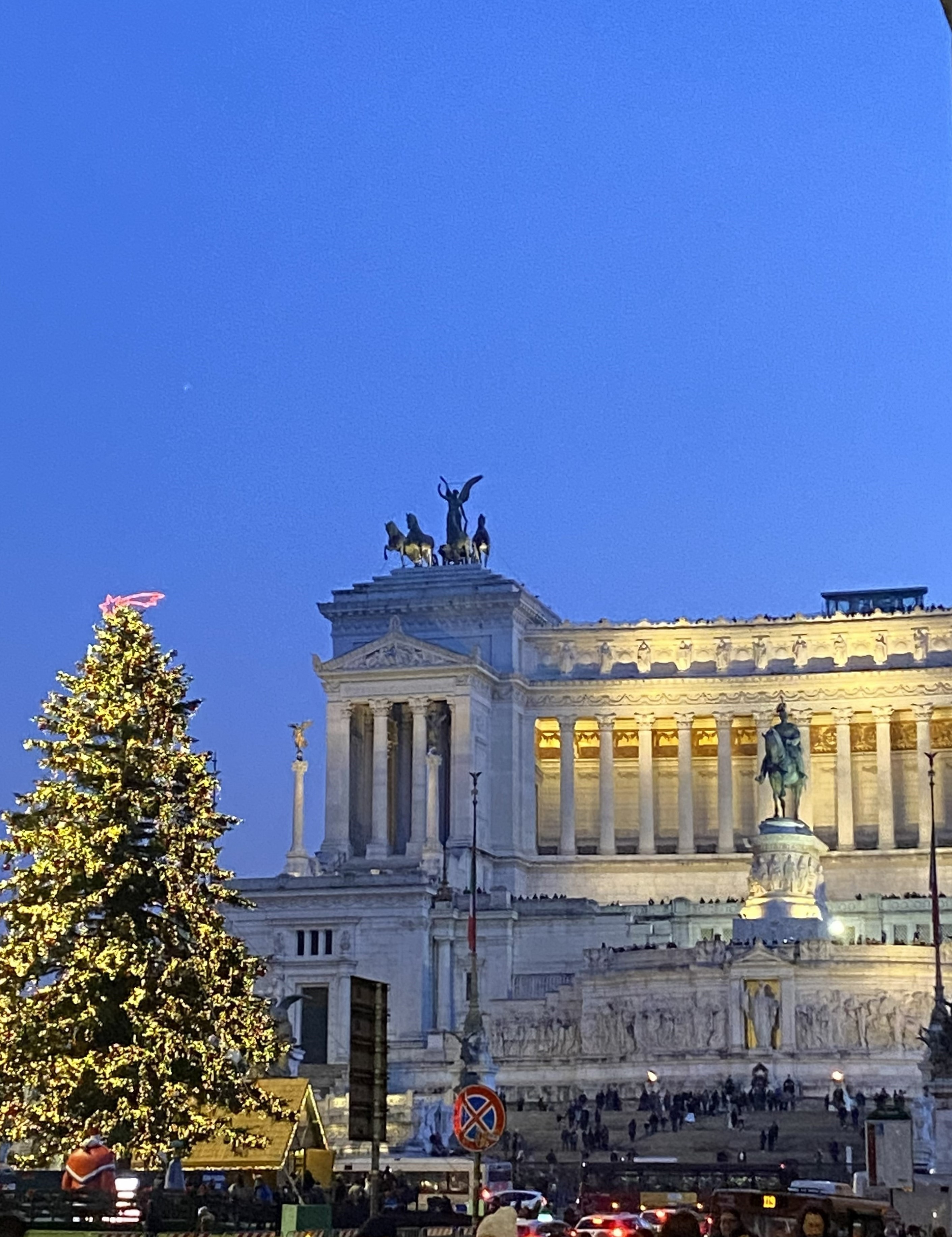 Altare della Patria illuminated at dusk with Christmas tree Rome