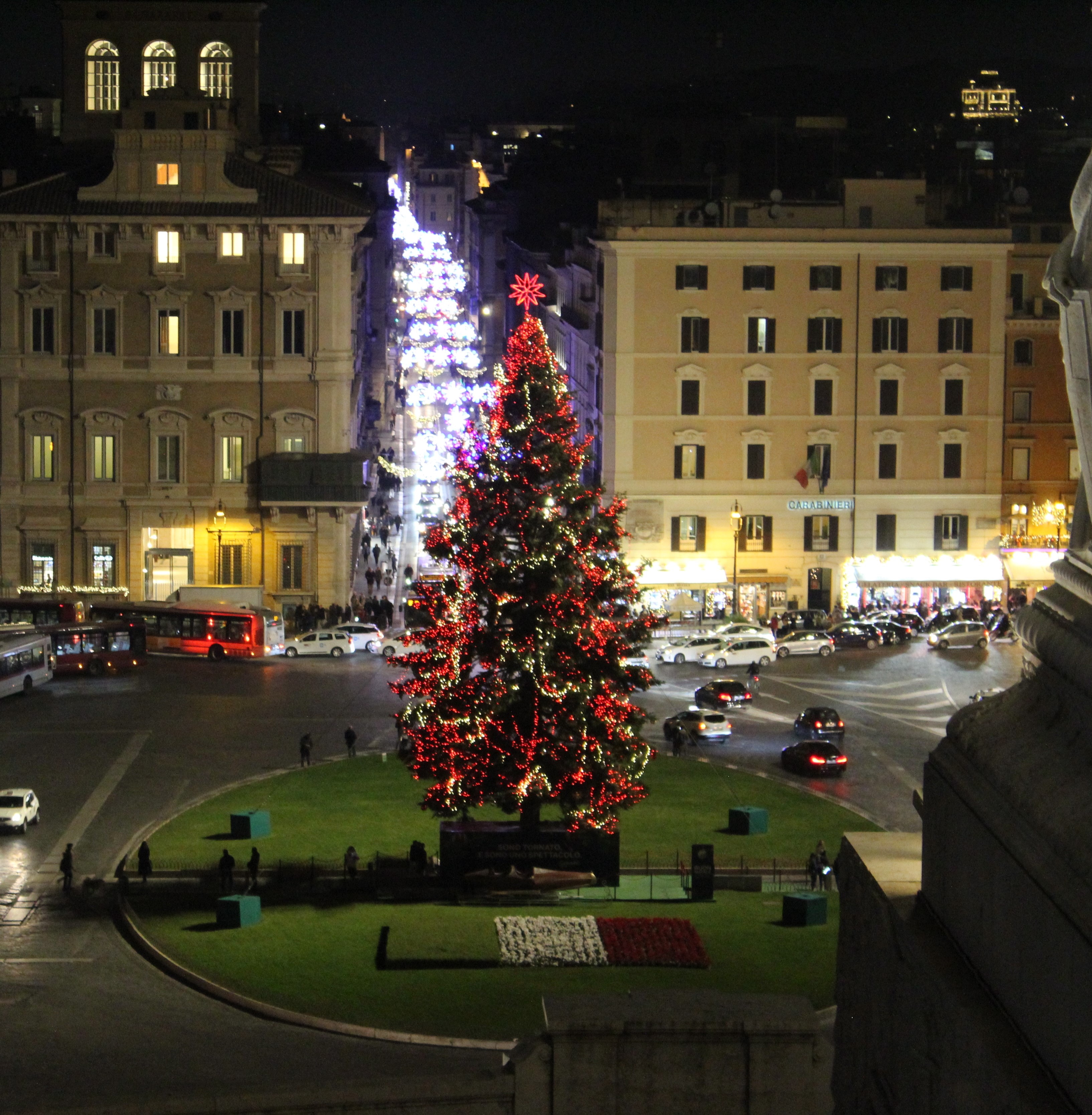 Piazza del Popolo Christmas tree illuminated at night Rome