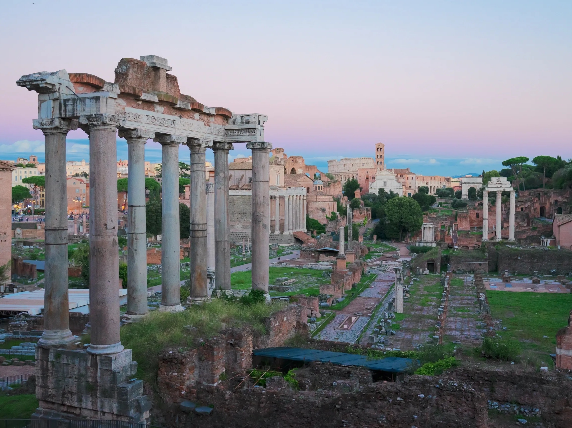 Roman Forum ancient ruins early morning golden light Rome Italy
